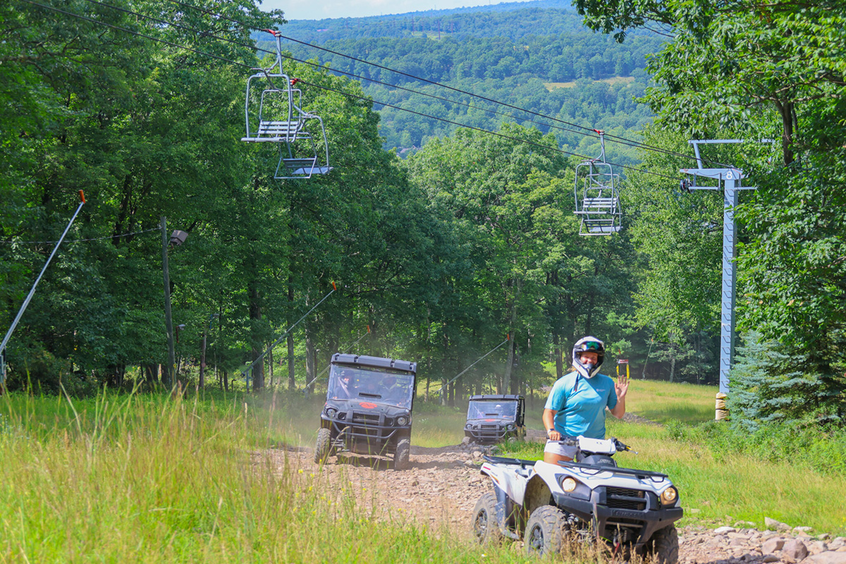 Ski lifts are empty, so UTVs rule the mountain in the warm seasons.
