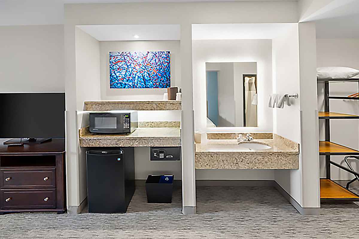 All rooms have a kitchenette with microwave, refrigerator , safe and adjacent sink.