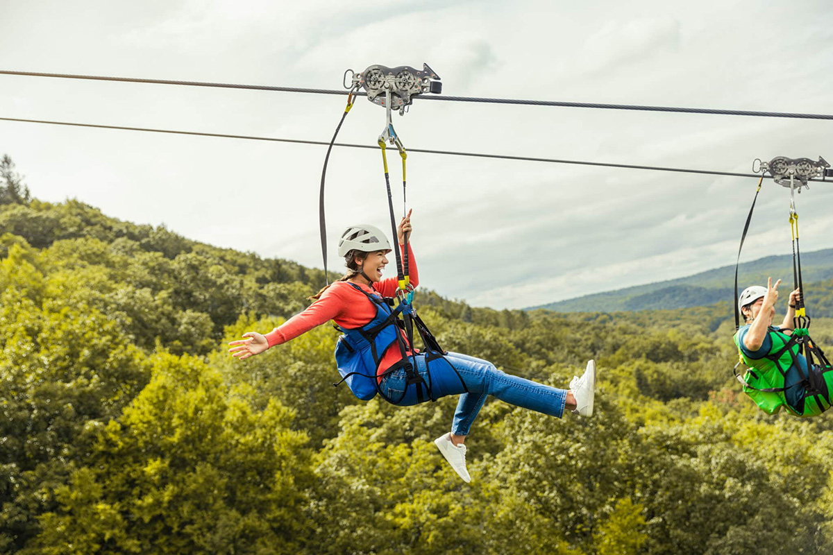 The Double Barrel Zipline — Race down the mountain.