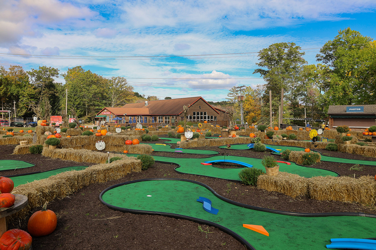 The ini golf course decorated for fall.